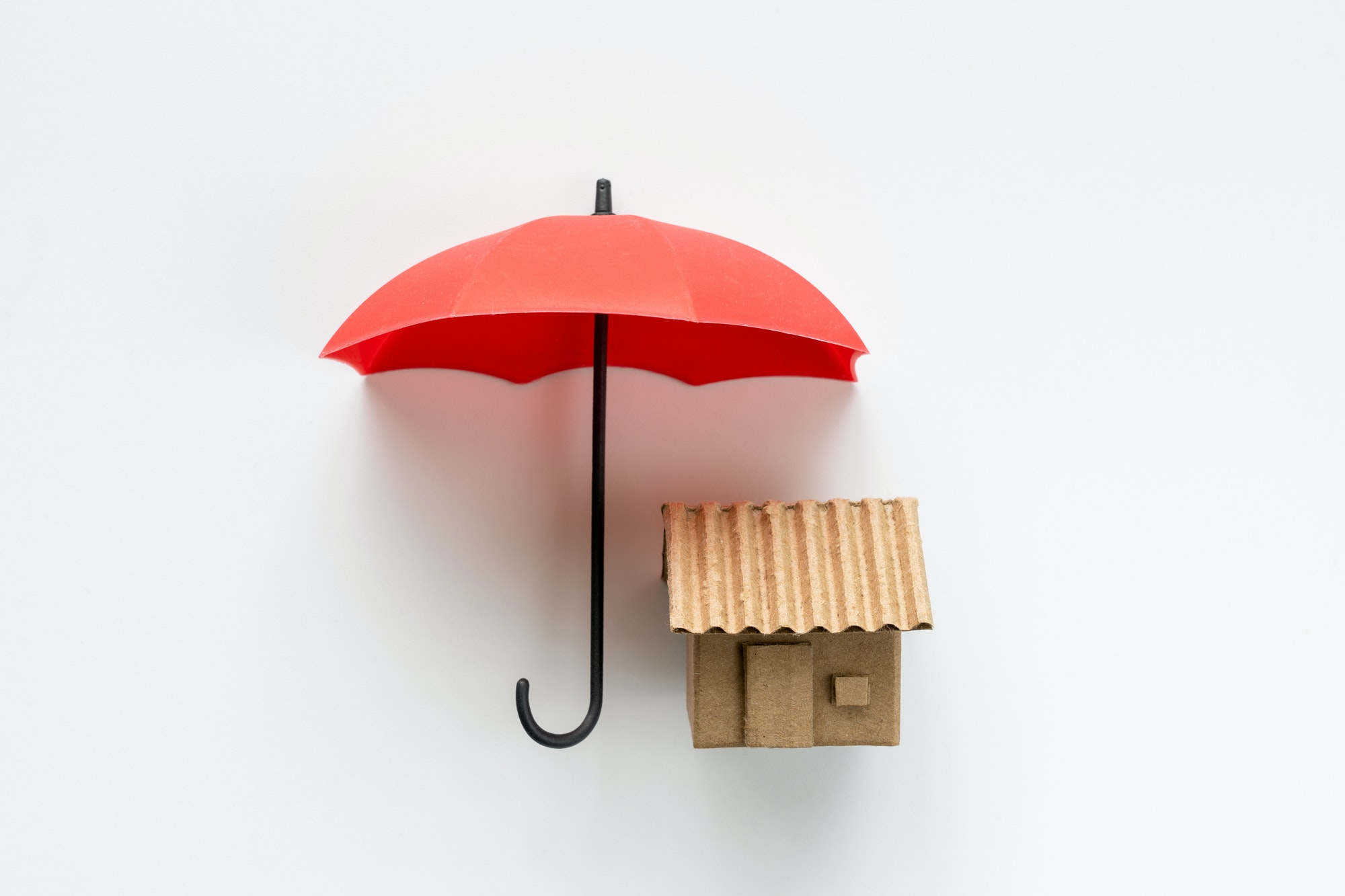 House under red color umbrella